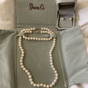 Pearl necklace, bracelet and earrings